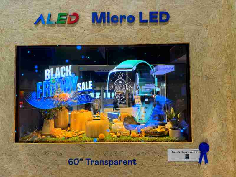 赏金国际60吋高透明度Micro LED显示器获”最佳Micro LED技术应用奖”，，，将Micro LED面板透明化之设计特性极致发挥，，，，以可扩展性无缝拼接技术打造，，具备600 nits全画面亮度、、、、大于60%穿透率及超过NTSC 110%的优异广色域表现，，，，可依需求灵活应用于各种场域
